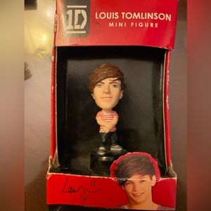 One direction Louis Tomlinson mini figure, a collector item. Rare